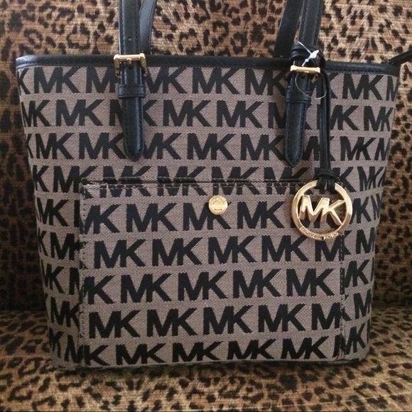 Michael Kors Handbags - NWT Michael Kors jet set tote. Firm price.